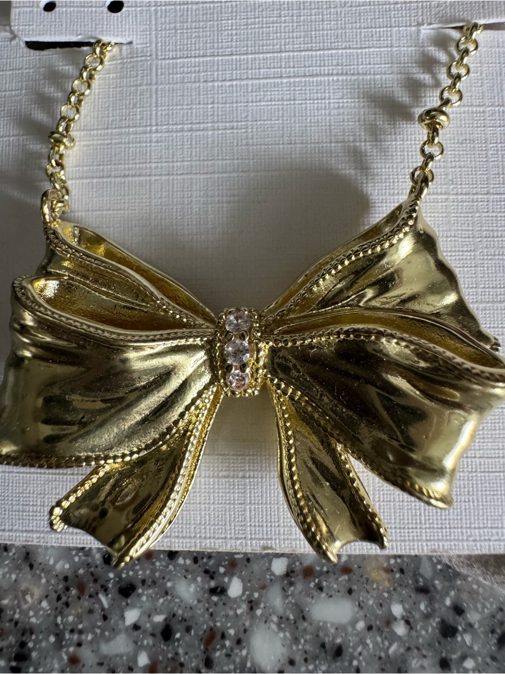Kendra Scott Shiny Gold Bow Necklace with Clear Crystals